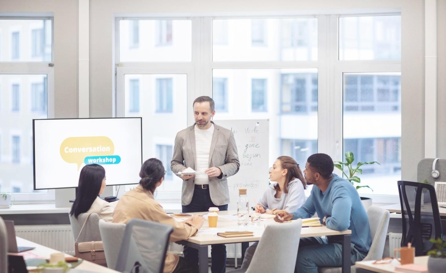 Business meeting discussing financial projections and investment strategies